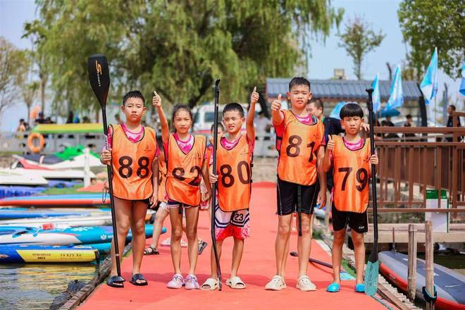 九游体育挥桨三菱湖 “体育+旅游”激活消费新场景(图3)