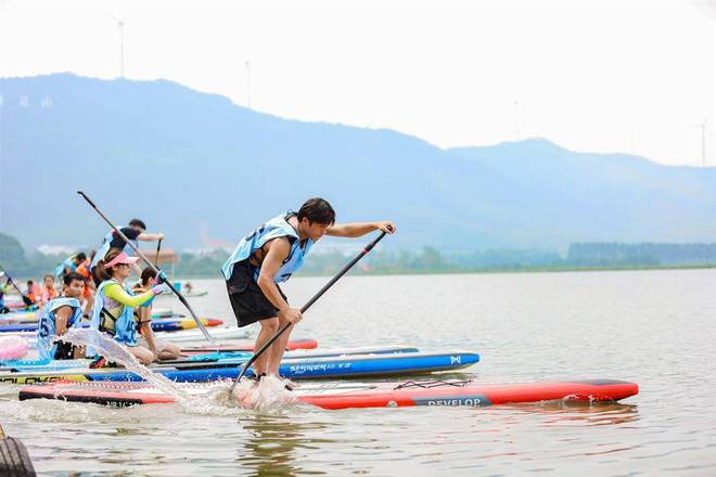 九游体育挥桨三菱湖 “体育+旅游”激活消费新场景(图4)