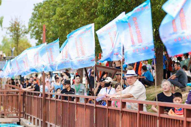 九游体育挥桨三菱湖 “体育+旅游”激活消费新场景(图6)