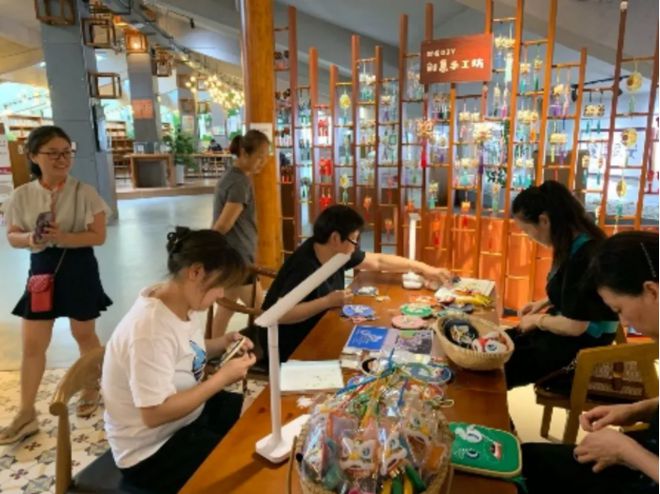 九游体育年味十足！过年就在家门口社区耍(图11)